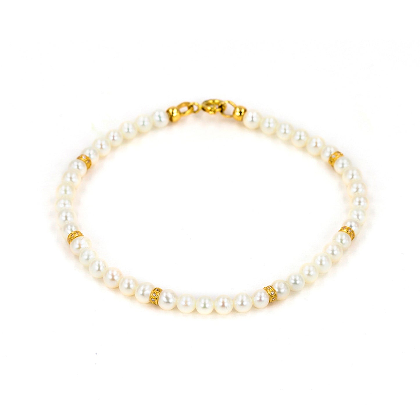 PULSEIRA OURO 19.2K C/ PÉROLAS E ZIRCÓNIAS